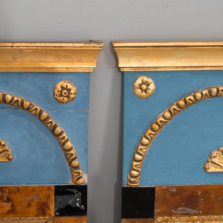 A set of two Empire and Empire style mirrors.