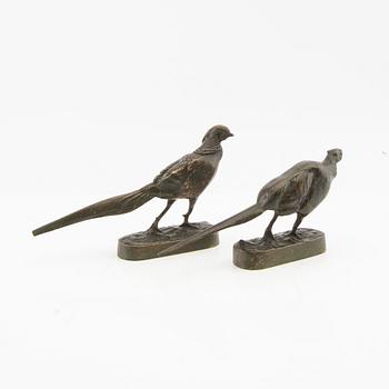 Decorative sculptures, a pair, 20th century, bronze.