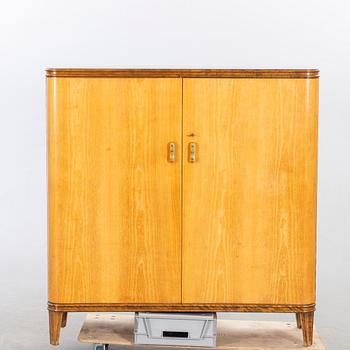An 1940:s birch and beech cabinet 'Haga'.