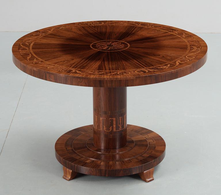 A 'Swedish Grace'  table with stylized inlays.