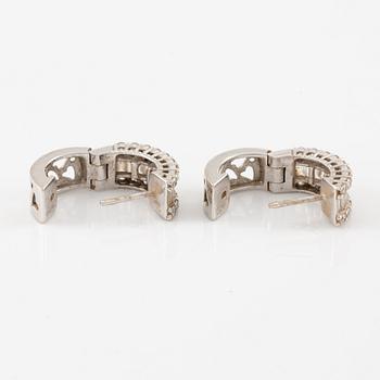 Earrings, a pair, 18K white gold set with baguette and brilliant-cut diamonds.