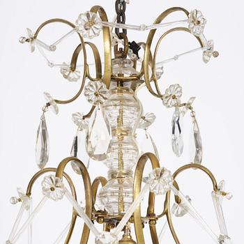 A seven-light gilt brass and cut glass rococo chandelier, mid 18th century.