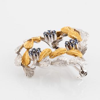 Brosch, krans 18K tvåfärgat guld och safirer.