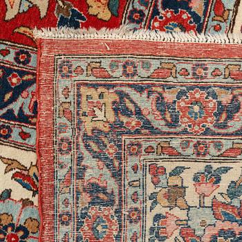 A carpet, semi-antique, Qum, ca 433 x 323 cm.