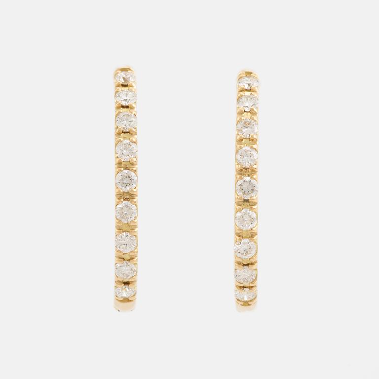 Brilliant cut diamond hoop earrings.