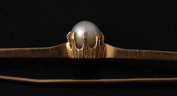 BROSCHNÅL, 18 K guld med pärla, 1923.