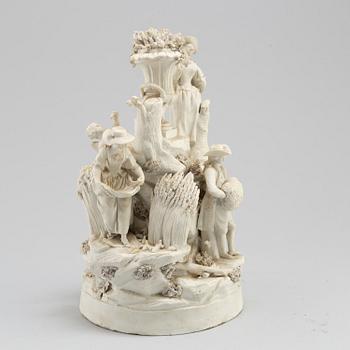 A porcelain figurine group circa 1900.