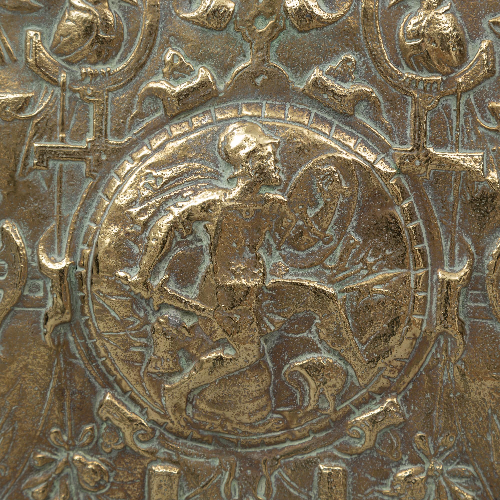 A 19th century brass fire guard.