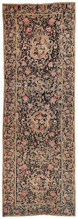 A Karabagh runner, South Caucasus, c. 649 x 228 cm.