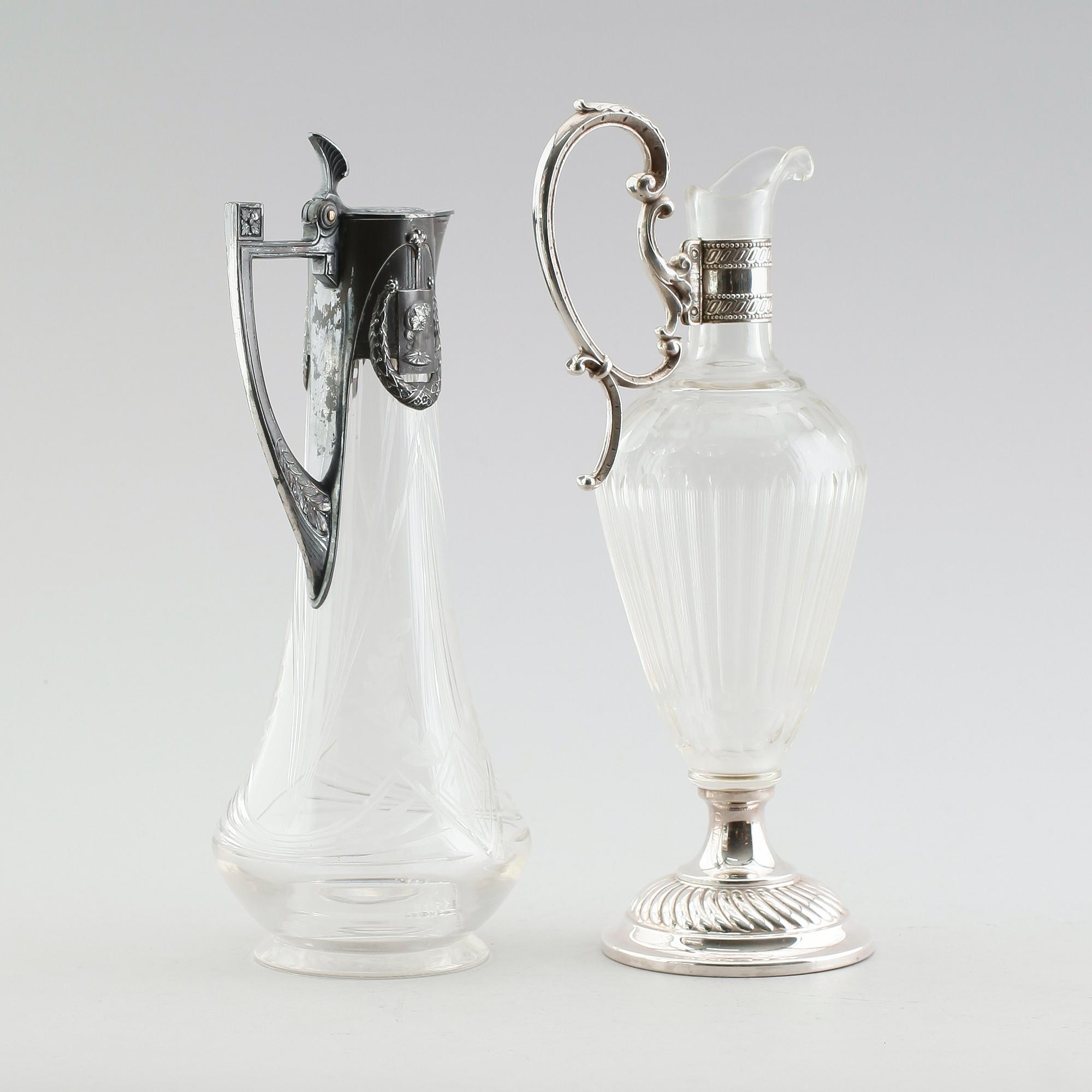 VINKANNOR, 2 st, glas, nysilver och försilvrad metall,  märkta WMFM och WMF, 1900-talets första hälft.