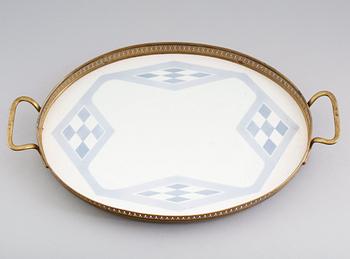 BRICKA, porslin och mässing, 1900-talets första hälft.