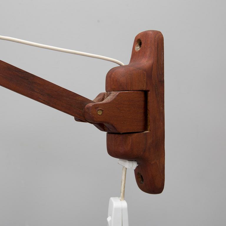 A 1950s teak wall light, probably from LUXUS.