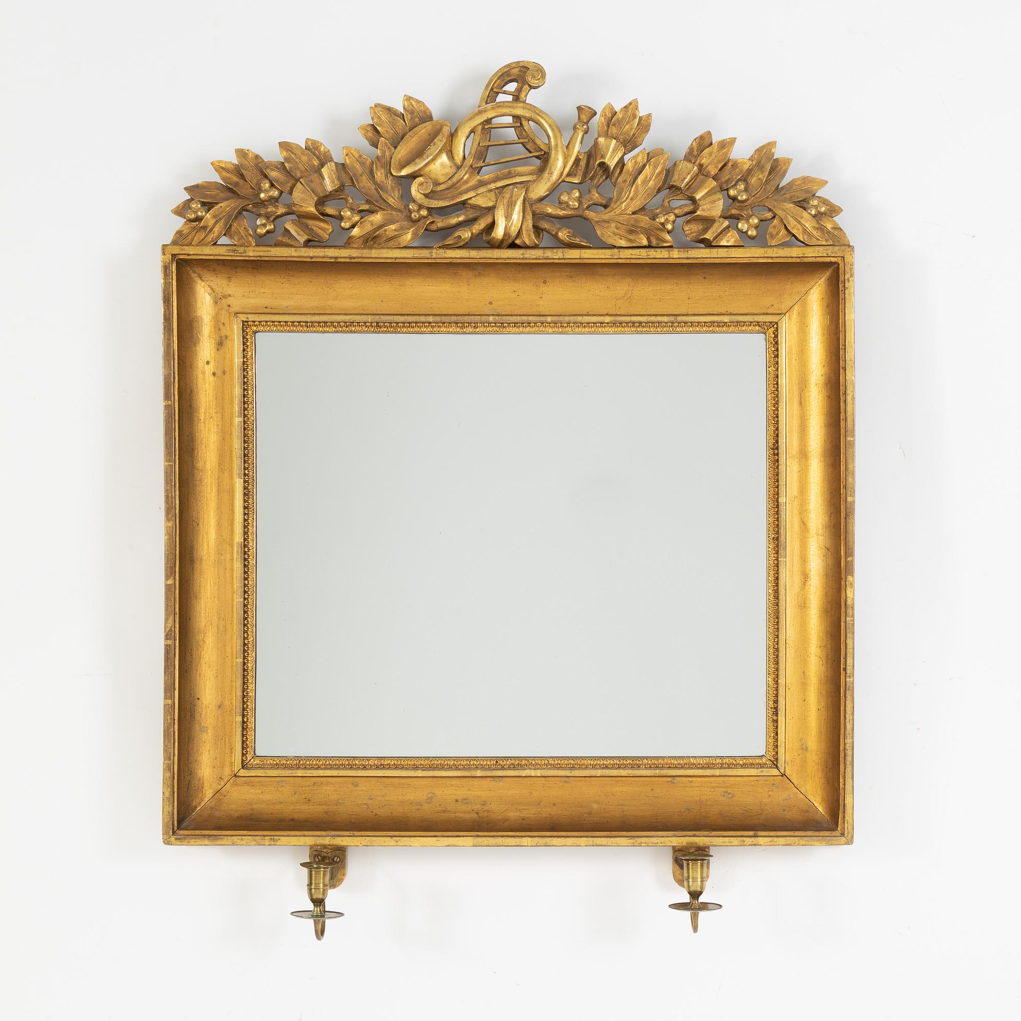 A gilt-wood mirror sconce, second half of the 19th century.