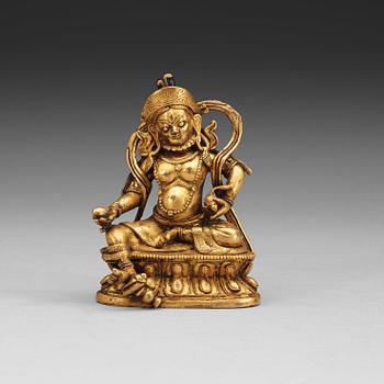 A Sino-Tibetan gilt bronze figure of Kubera, 18th Century.