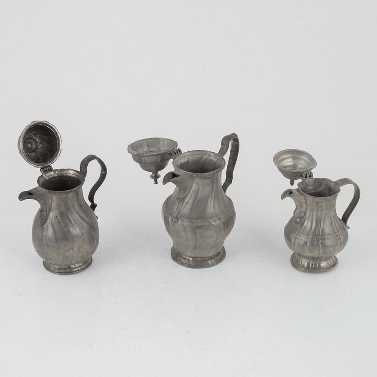 Three Rococo pewter coffee pots, 18th century.