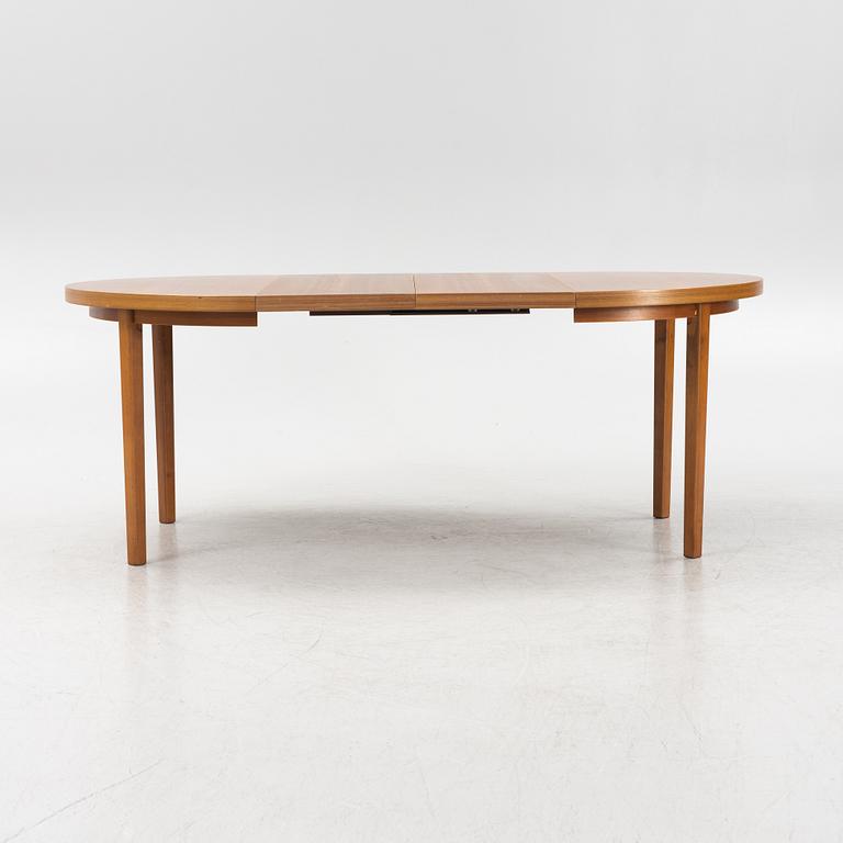 A round teak dining table, second part of the 20th Century.