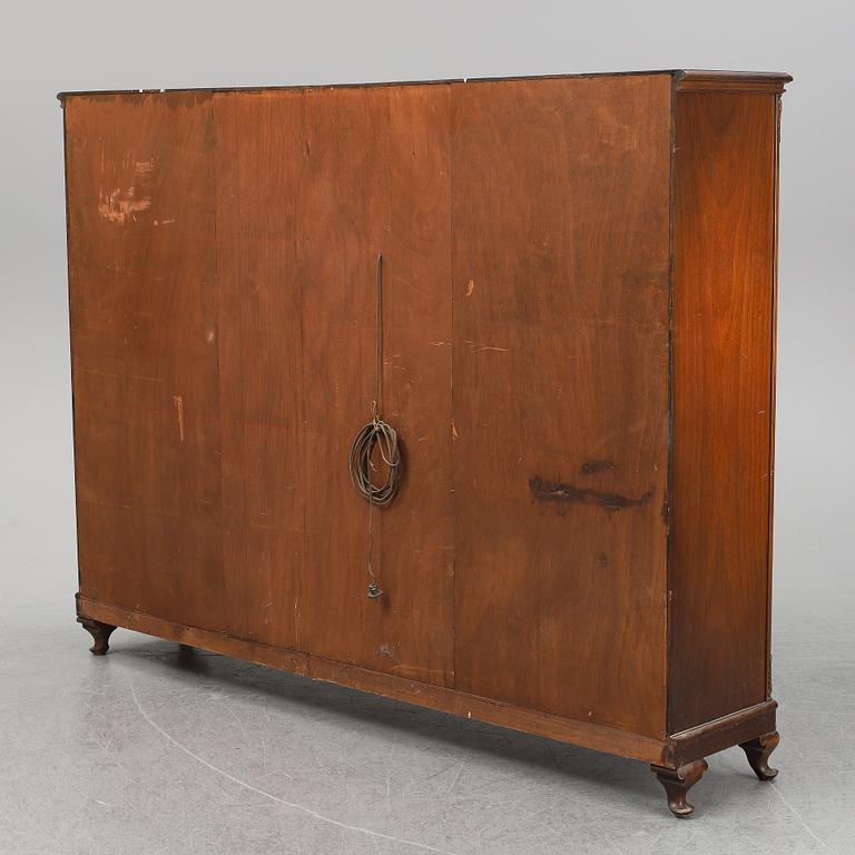 An earl 20th Century cabinet.