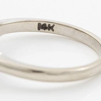 Ring 14K white gold with baguette-cut diamond.
