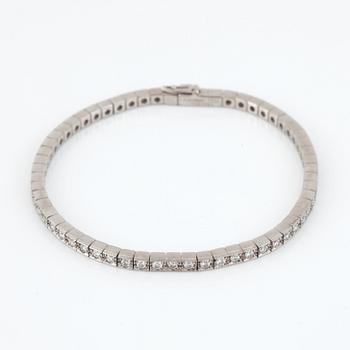 A brilliant-cut diamond, circa 1.70 cts, bracelet. Signed Cartier.