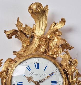 A French Louis XV gilt bronze clock marked Balthazard Paris.