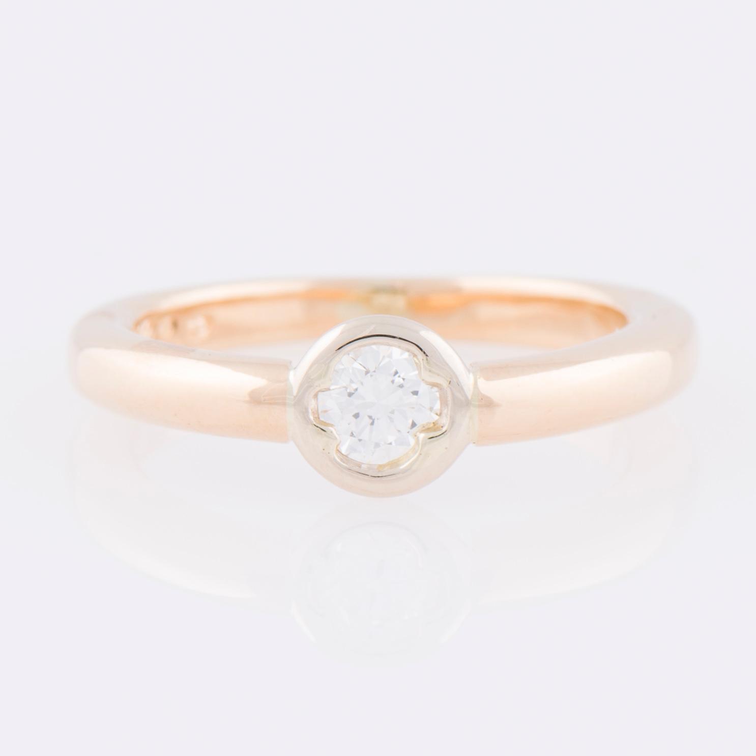 RING, briljantslipad diamant, 18K guld. Windy & pojat, Helsingfors 1992.