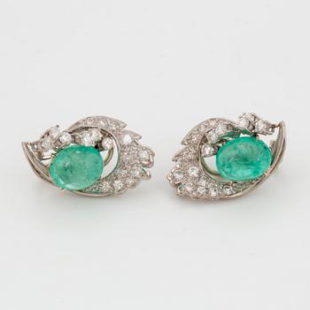 Cabochon-cut emerald and brilliant-cut diamond earrings.