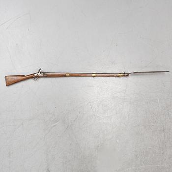 A Swedish flintlock gun, 1815 pattern.