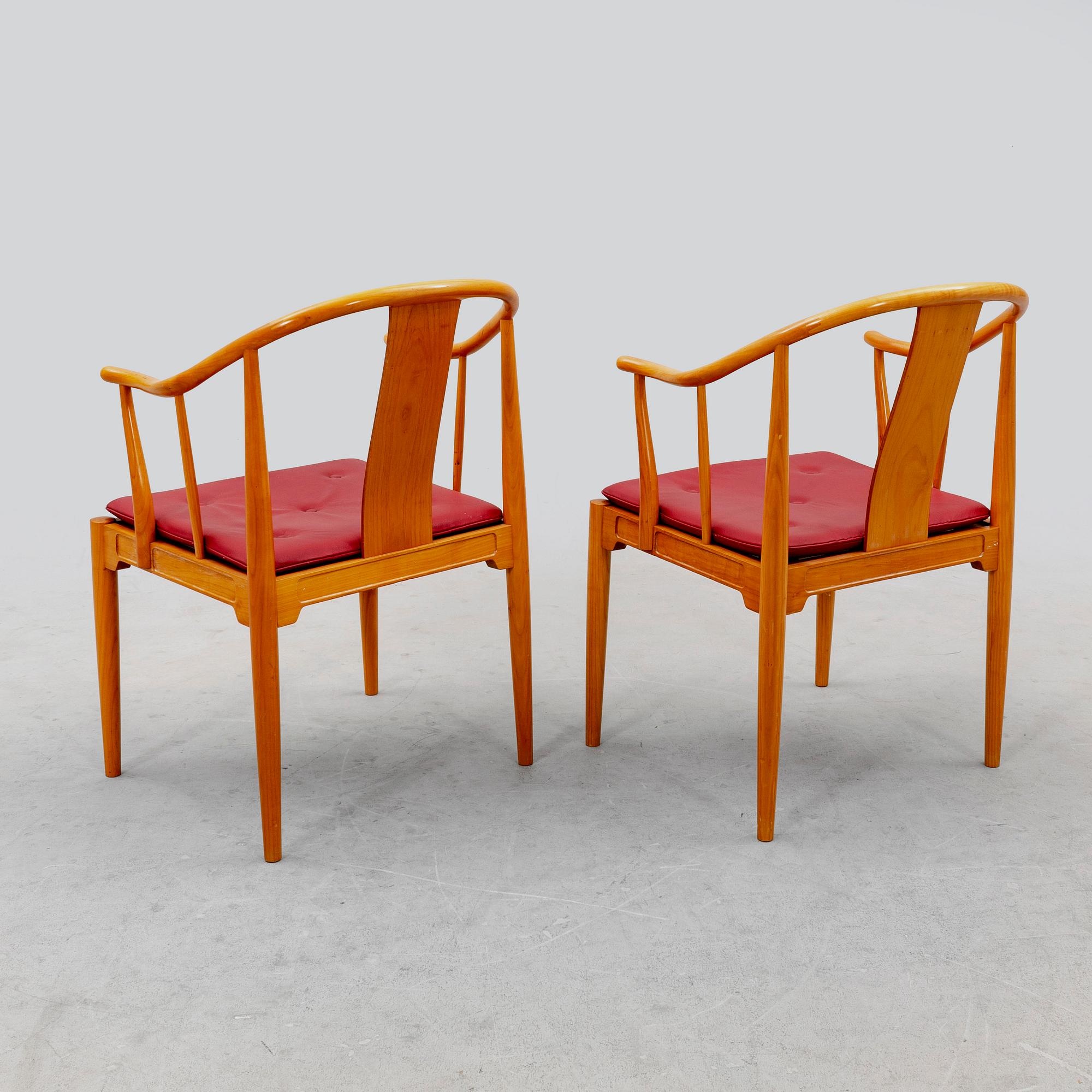 Hans J Wegner, a pair of "China" chairs for Fritz Hansen, Denmark, dated 1994.