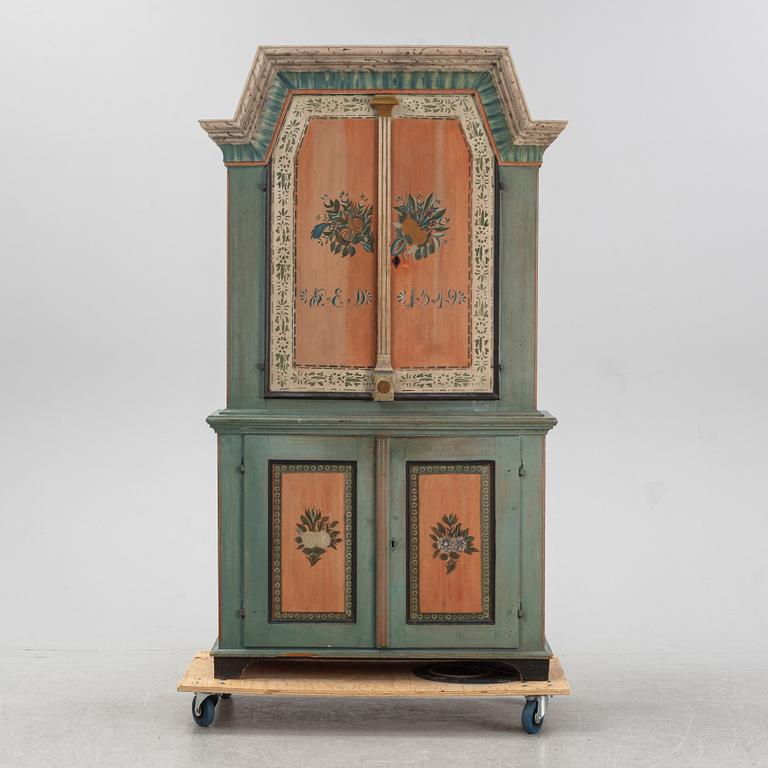 A painted Swedish provincial cabinet from Jämtland, dated 1849.