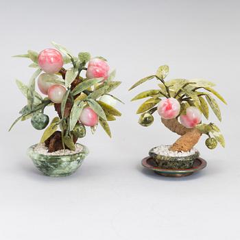 Two Chinese table decorations with fruits and leaves in various stones, the latter half of the 20th century.