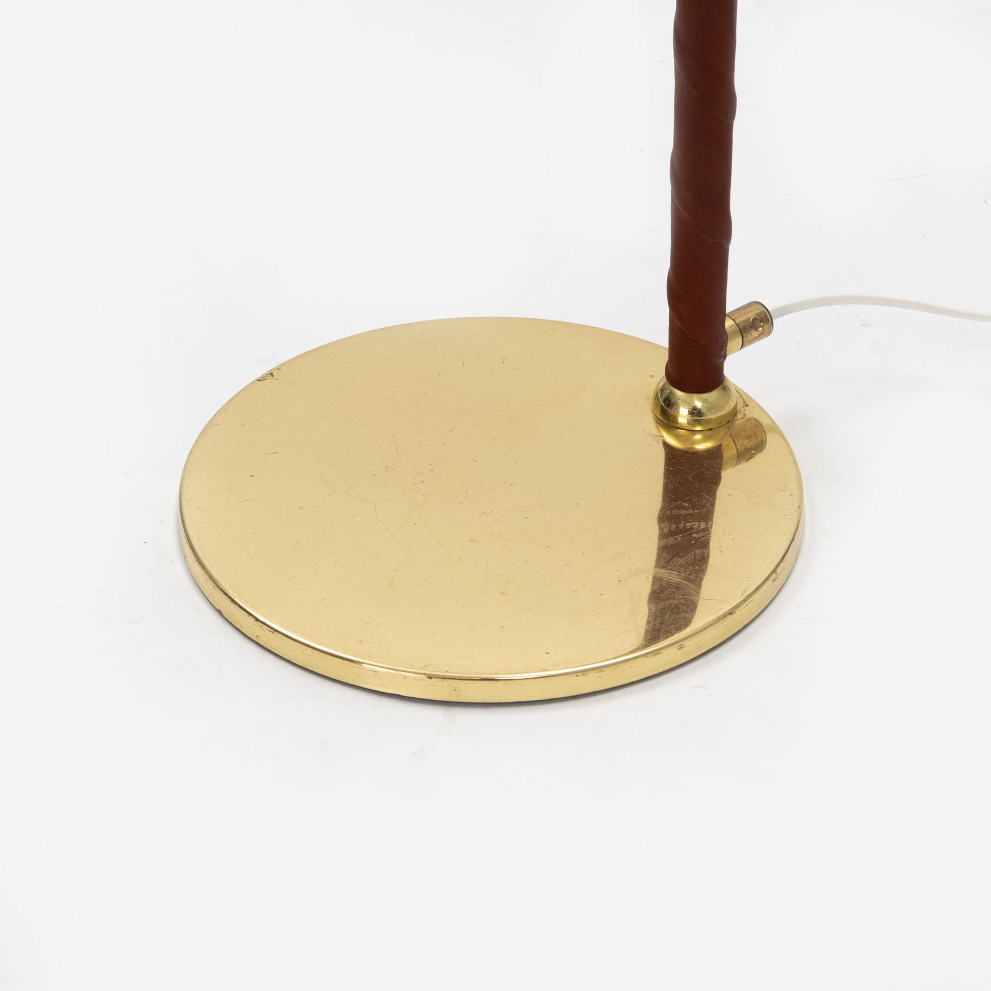 A brass floor lamp from Öja.