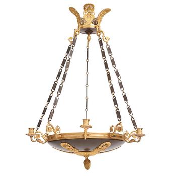 121. An Empire.style five-branch patinated and gilt bronze chandelier, later part of the 19th century.