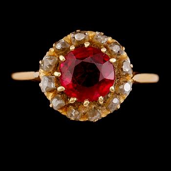RING, 18 k guld, diamanter och röd sten. Total vikt 3 g.