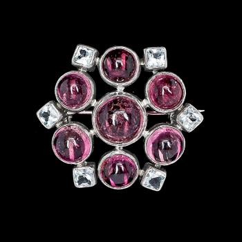 BROSCH, silver med bergkristall och rosa turmaliner, Hugo Strömdahl, Stockholm, 1959.