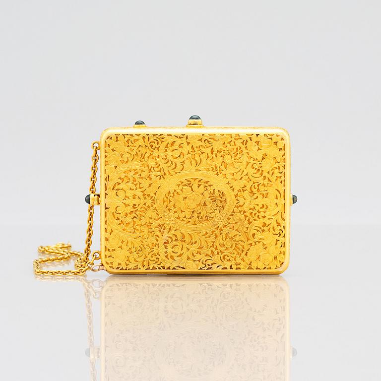 Aftonväska, sk. compact, guld, safirer och briljanter. troligen Amerika 1910-tal.