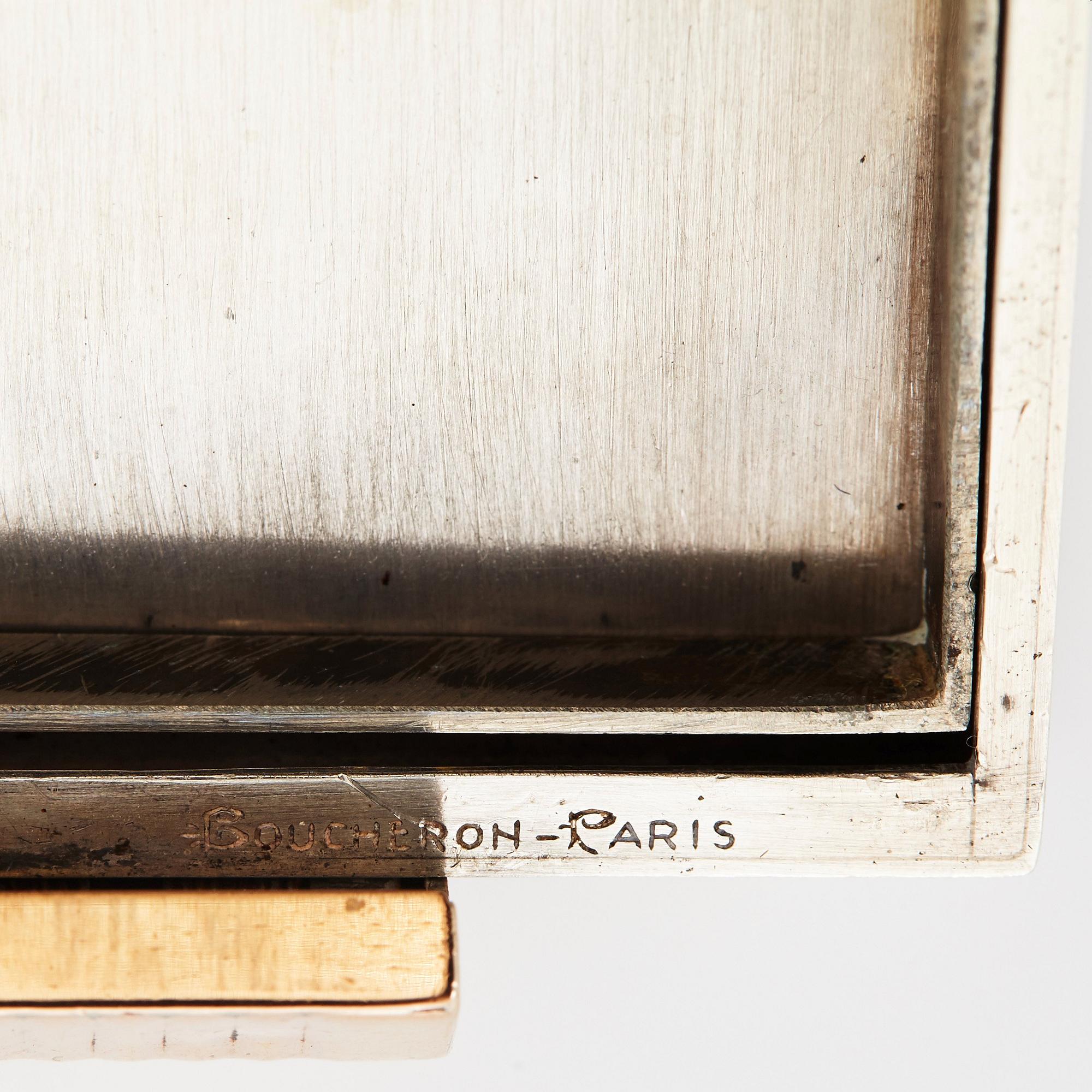 Boucheron puderdosa silver med fasettslipade rubiner.