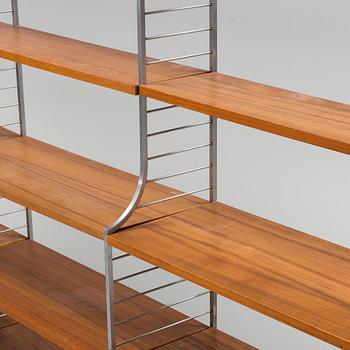 A 1950s "String" four-section book shelf by Nils Strinning.