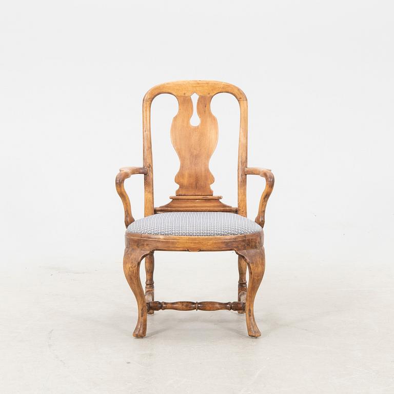 A mid 1700s Rococo armchair.
