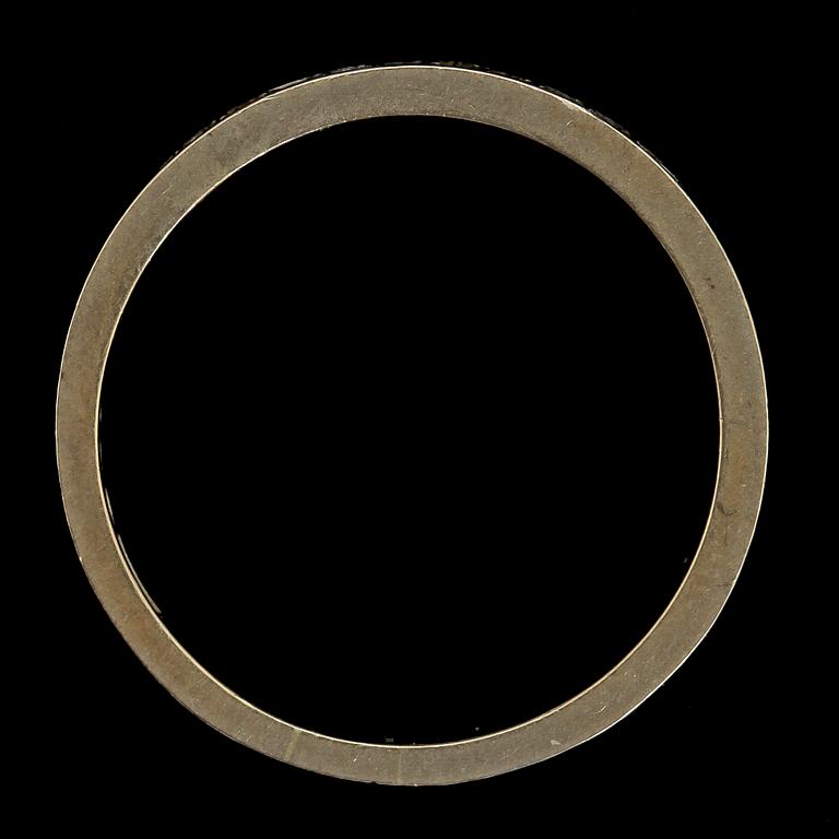 RING, 18k vitguld med tio åttkantslipade diamanter, 0.15 ct enl gravyr, stmpl GGG, Göteborg, 1966. Vikt 3 g.