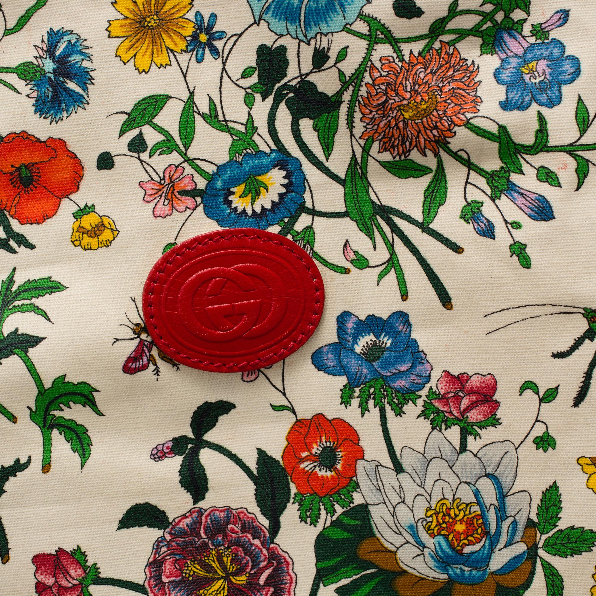 GUCCI, a 'Flora' garment bag.