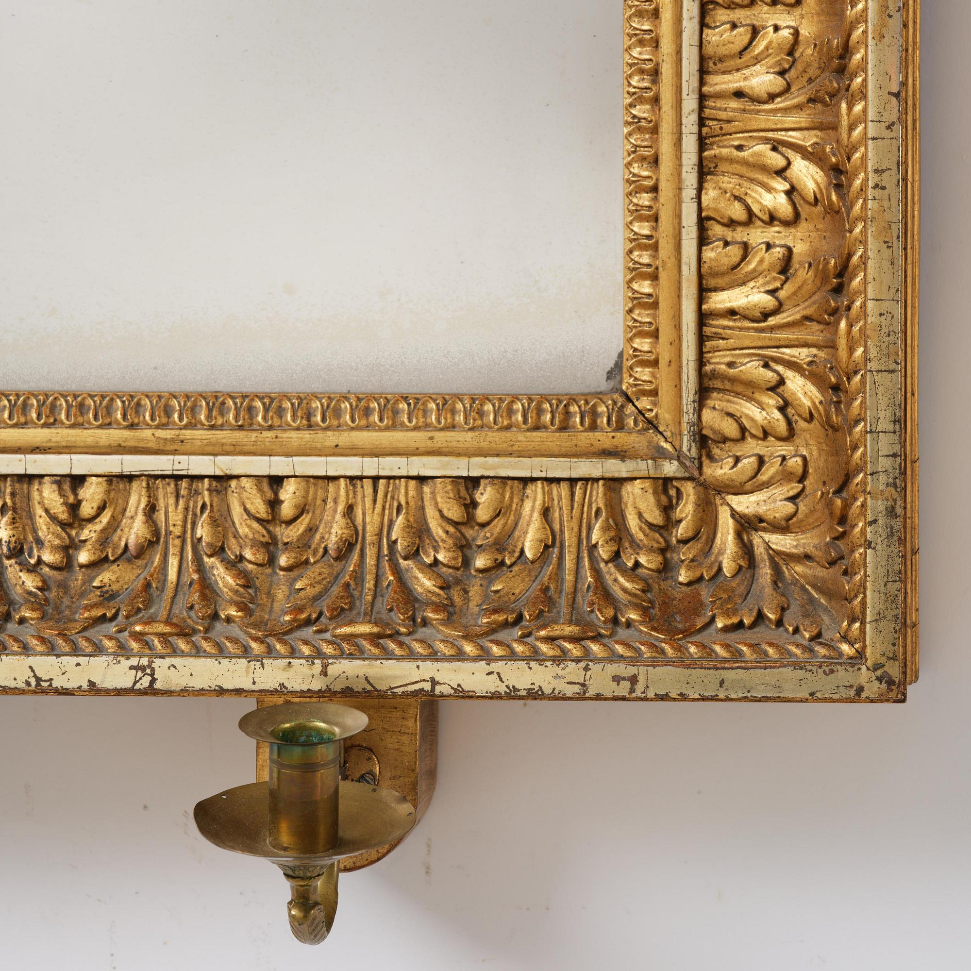 A two-branch Empire giltwood girandole mirror by P. G. Bylander (master in Gothenburg 1811-58).