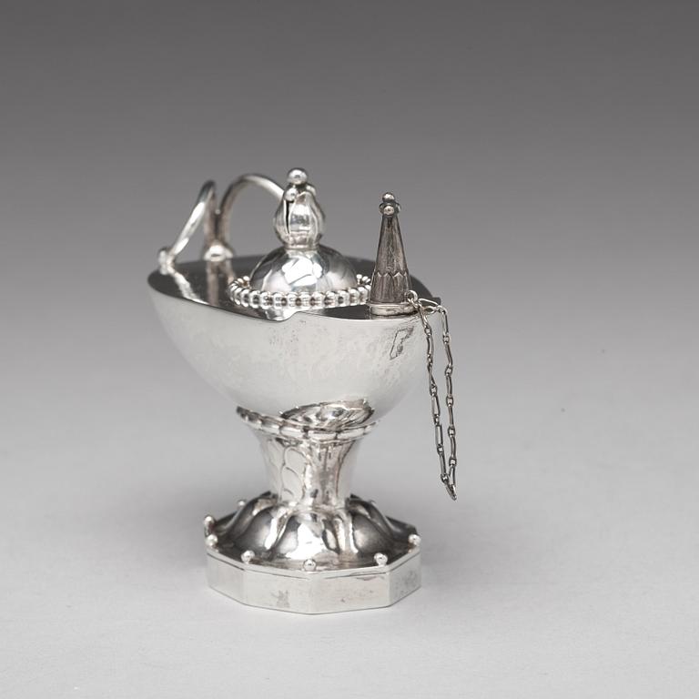 Georg Jensen, a cigar lighter in the shape of an oil lamp, Copenhagen 1918, design no 12, 830/1000.