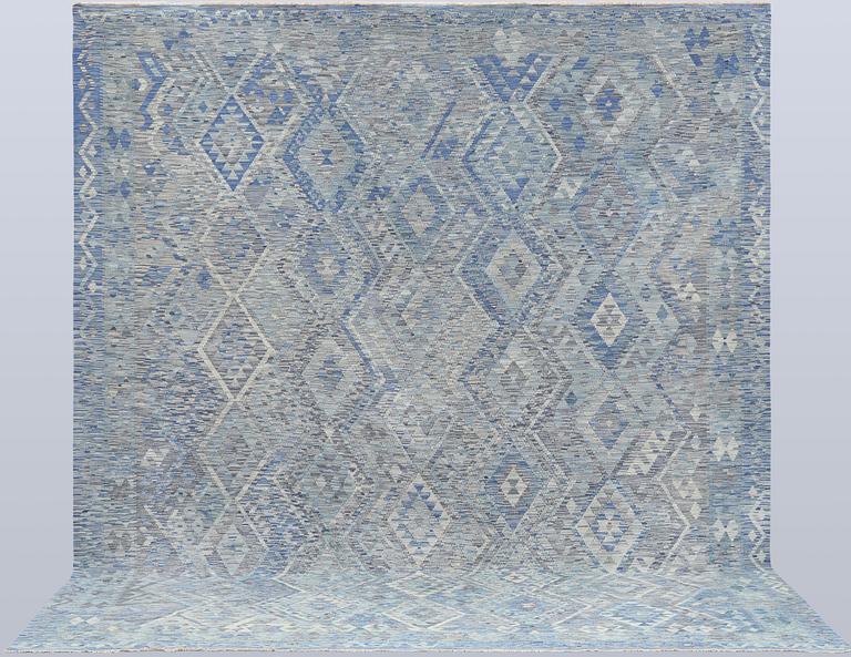 A Kilim carpet, approx. 375 x 311 cm.