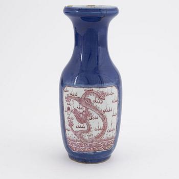 A powder blue and copper red enamel 'dragon' vase, late Qing dynasty, 19th Century.