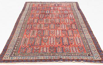 An antique carpet, probably Shirvan, c. 330 x 172 cm.