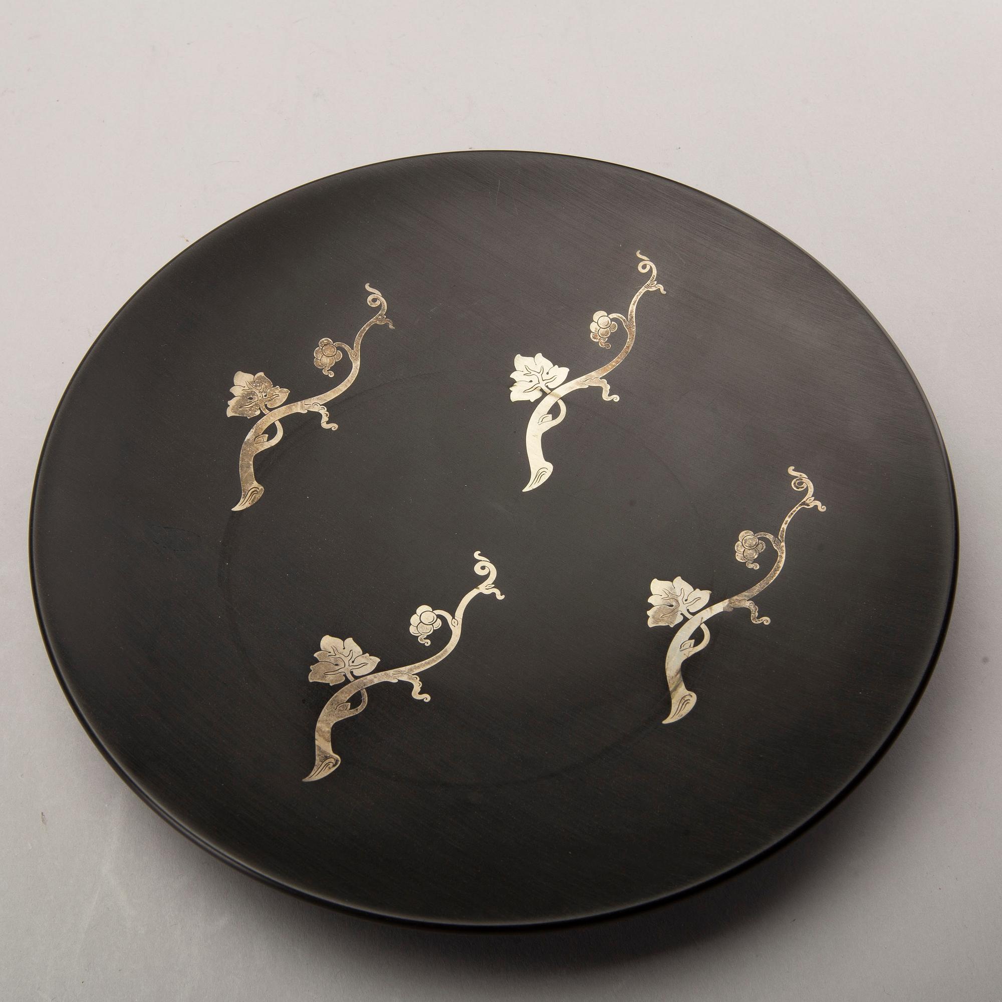 A Swedish 20th century set of 14 plates in bakelite and silver mark of T Wendt Helsingborg 1945.