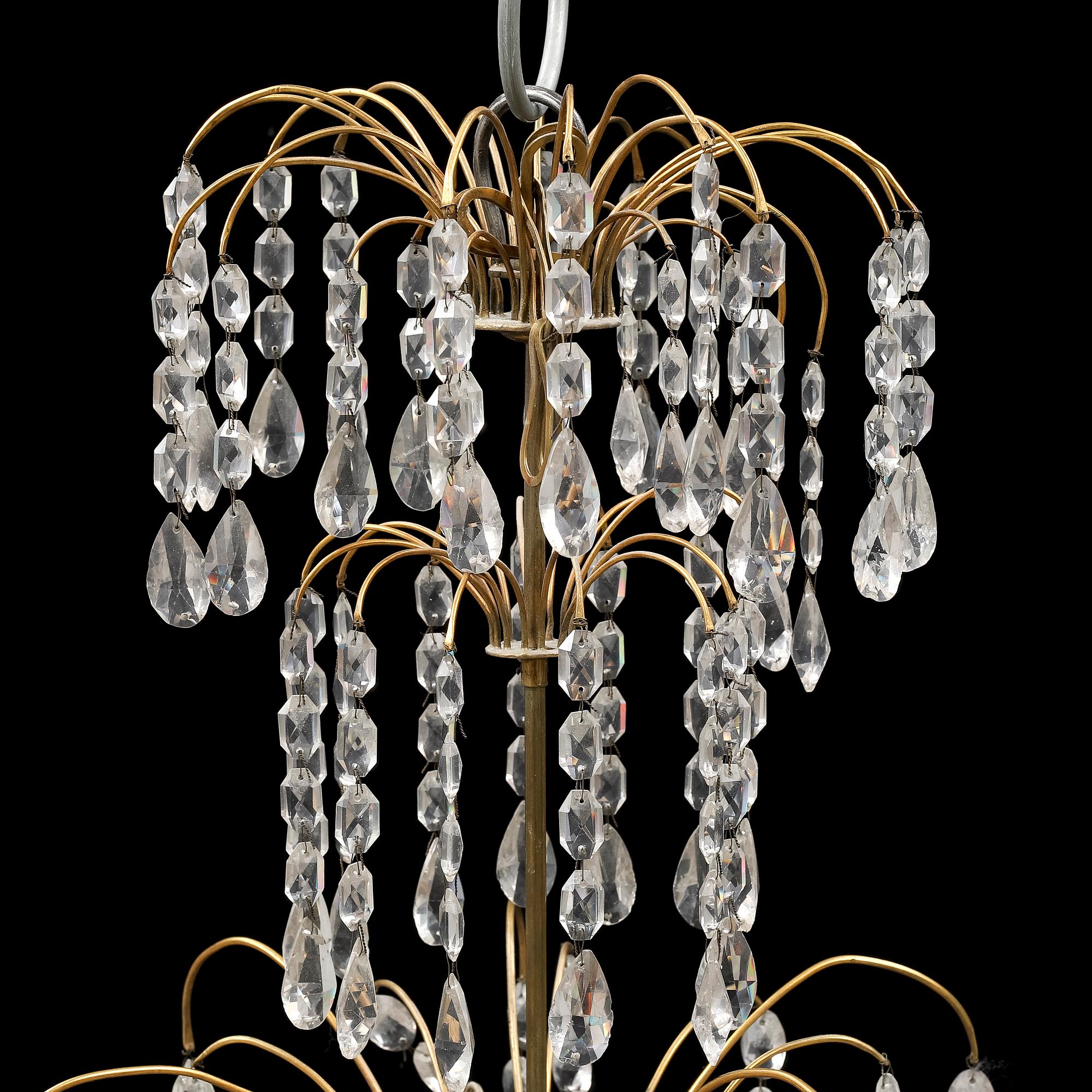 A Gustavian-style eight light chandelier, 20th ct, some parts older.
