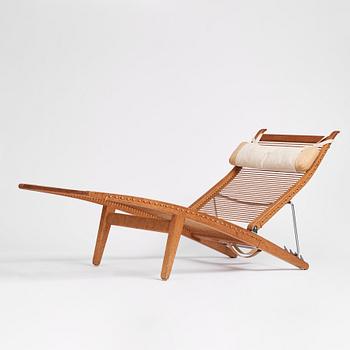 Hans J. Wegner, an oak lounge chair model "JH 524", Johannes Hansen, Copenhagen.