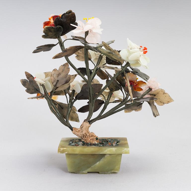 A Chinese table decoration in various stones, latter half of the 20th century.