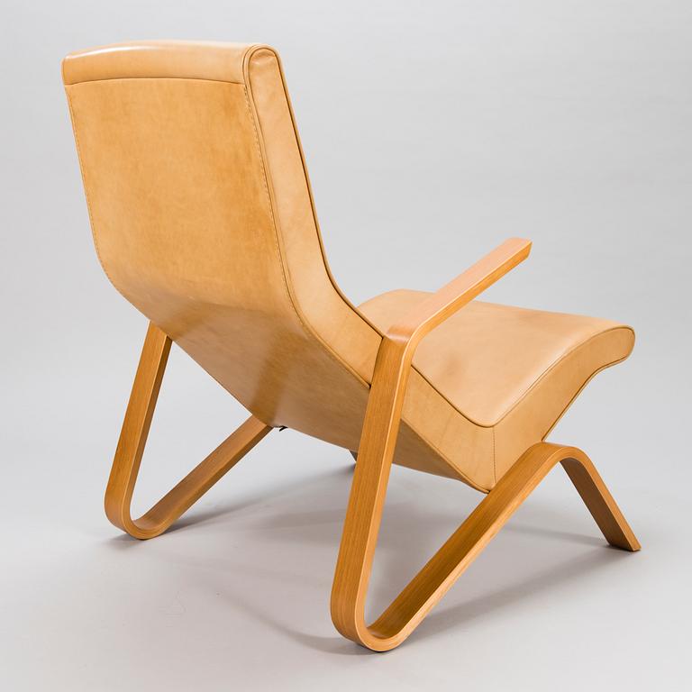 EERO SAARINEN, a 'Grasshopper' armchar and ottoman manufactured under licens by Tetrimäki Finland.